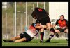 Leo Paredes placando a un jugador del Torroella